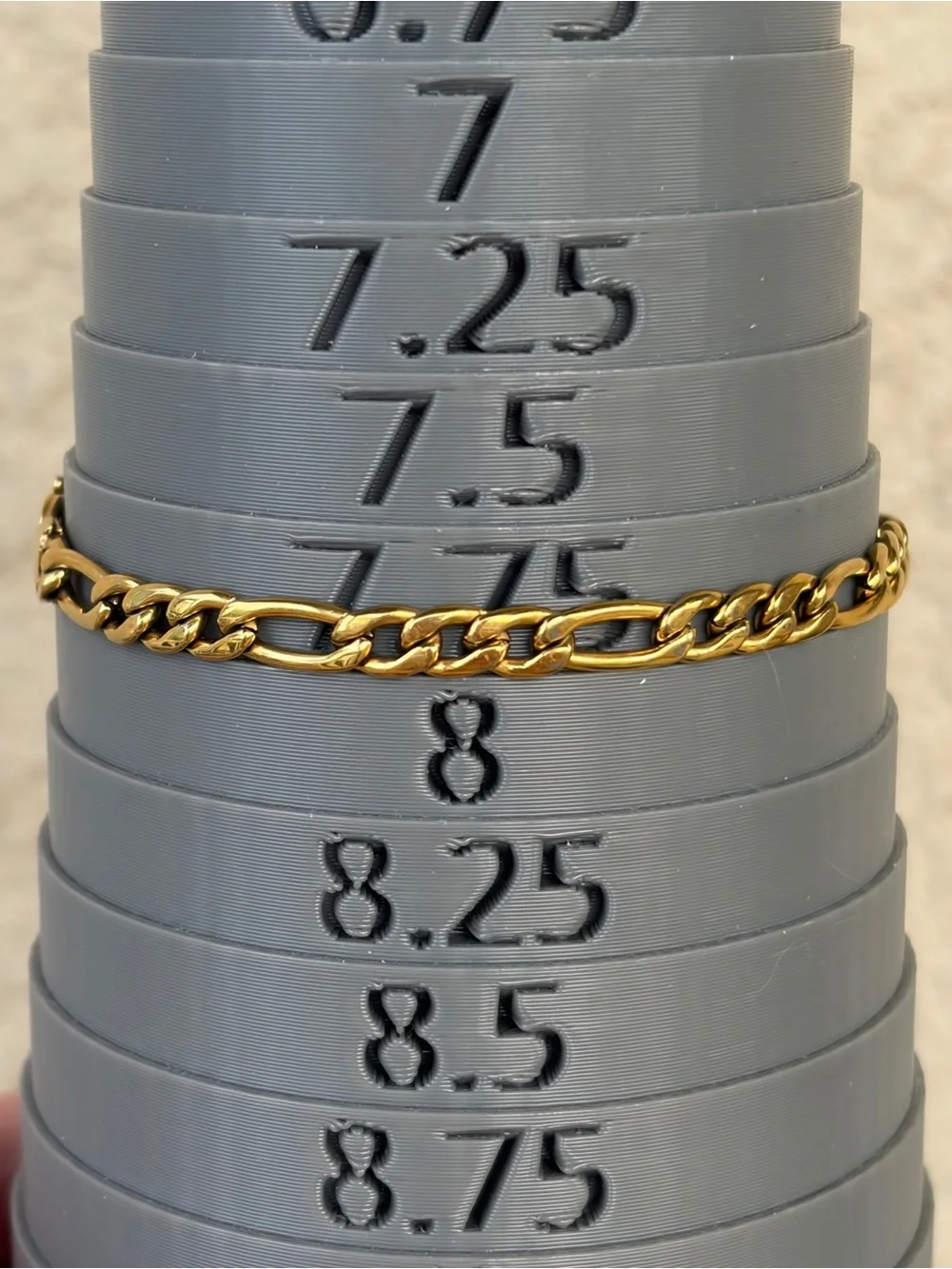 JCM Stainless Steel Gold Overlay Figaro Chain Bracelet